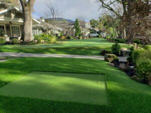 artificial grass putting green with chipping area