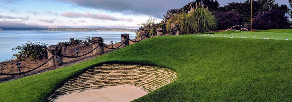 private putting green on ocean with stacked sod sand bunker